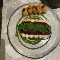 Smoked watermelon. (Side of gnocchi were honestly whatever. Watermelon was the star)  at Casa Lėlytė in Bogota