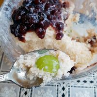 vegan Bingsu based on soy milk, topped with red bean paste and fresh fruit on the bottom. at La Bonne Tarte in Seoul