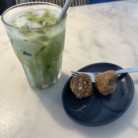 Iced matcha latte with oat milk, vegan protein balls   at The Social Space - Chinatown in Central Singapore