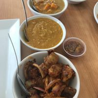 Vegan sides. Deviled potatoes, Dahl, squash curry, carrot pickles at Serendib in Ellsworth