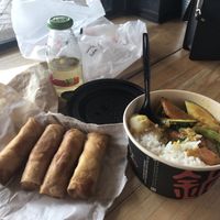 Mixed seasonal veg with steamed rice and Satay sauce, 4 vegetable spring rolls (vegan)  at Wok'd in Endeavour Hills