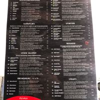 One side of the menu, updated with a total of 4 vegan options and some more vegetarian    at Cozy Creperie & Coffee Shop in Vejle