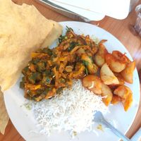 Karahi bhindi, adraki gobi, boiled rice,masala chips and poppadoms at Zeera in South Shields