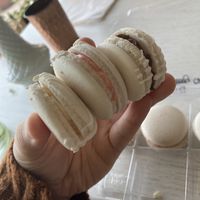 Top to bottom: chocolate, vanilla strawberry, and vanilla macaroons  at Eden Cafe & Bakeshop in Batavia