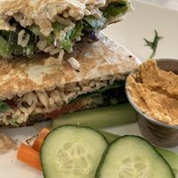 Black bean burger panini wrap, hummus veggie side. Yum! Ask for salsa, even better!  at Eden Cafe & Bakeshop in Batavia