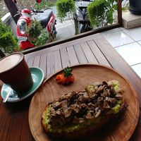 Large size cappucino w/ coconut milk + avo toast at Namaskara Coffee & Superfoods in Ubud