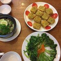 Sauteed veggies from the buffet, an lac claypot rice, crispy tofu at Au Lac in Da Lat