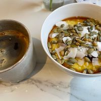Americano and golden porridge  at Kale+Coco in Dublin