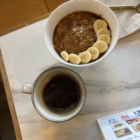 Porridge and coffee   at Kale+Coco in Dublin