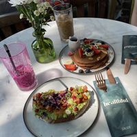 Broodje avocado, dragon fruit shake, iced coffee and pancakes🩷  at Healthful in Rotterdam