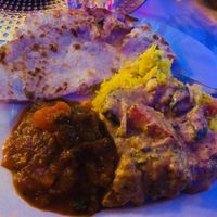 Vegan fake beef vindaloo & vegan veg korma with pea pulao & aloo paratha. at Kitchen Samrat in Footscray