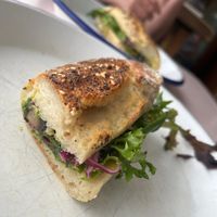 Vegan sandwich (we asked them to cut it in half, so technically the two you see are one;))  at Sunday Sustainable Bakery in Byron Bay