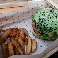 Jungle burger and potato wedges at Flower Burger in Bergamo
