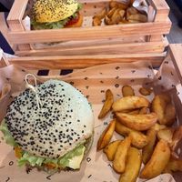 Zucchini burger and chickpea burger with baked potatoes   at Flower Burger in Bergamo