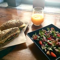 Tofu sandwich, sweet potatoes salad & fresh orange juice. at Raiz in Sintra