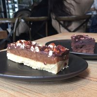 Raw snickers bar & aubergine brownie  at Wolfox in Hove