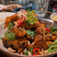Tempura eggplant with a few cashews for protein. Decent quality but not very filling at Suzie Luck's in Battery Point