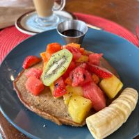 Vegan pancake with chia seeds and fruit  at Aroma Coffee Bar in Cahuita