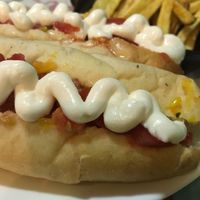 Some weekends they have the promotion 2 hotdogs + French fries $4.000 at Lazy Vegan in Santiago
