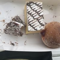 Vanilla slice, jam donut and our mostly devoured lamington   at Flour of Life Bakery in Helensvale