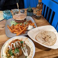 beyond burger, and hummus with pita at Hummus Küch' in Frankfurt