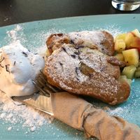 Dessert option fried banana with cream and fruit  at Vabiou's in Hamburg