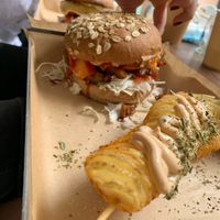 Oyster mushroom gyros burger and potato spiral. at Vegan Beat in Athens