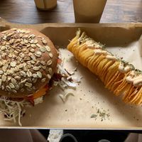 Oyster mushroom gyros burger and potato spiral. at Vegan Beat in Athens
