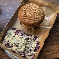 The big boss burger with a side salad 🤤  at Vegan Beat in Athens