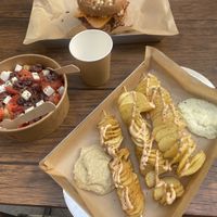 Gyros Burger, Greek Salad and Spiral Potatoes with hummus and tzatziki    at Vegan Beat in Athens