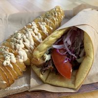 Mushroom-based vegan gyros with spiral potatoes as a side  at Vegan Beat in Athens