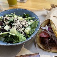 Mushroom-based vegan gyros with spiral potatoes with a side salad  at Vegan Beat in Athens