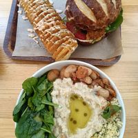 Cauliflower bites burger, potato spiral, celeriac puree with giant beans. at Rhino Vegan Beat in Athens