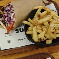 Sandwich with french fries at Rhino Vegan Beat in Athens