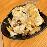 Fries with vegan tzatziki saucee  at Rhino Vegan Beat in Athens