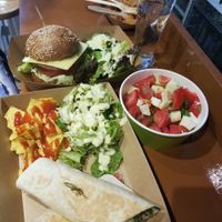Vegan Beat tortilla wraps, Greek salad, burger.  at Rhino Vegan Beat in Athens