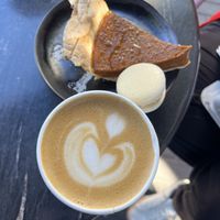 Pumpkin pie, eggnog macaron, oatmilk cappuccinoo  at Dark Hall Coffee in Phoenix