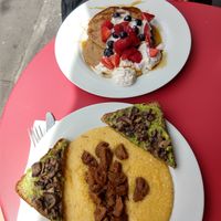 Pancakes and Polenta with sausage and mushroom avocado toast at Greedi Vegan - Bergen St in Brooklyn