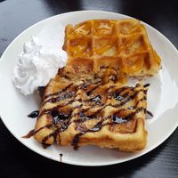 Waffles. This one is half with mango sauce, half with chocolate sauce at SpringInsFeld in Munich