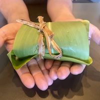 Leftovers wrapped in ti leaves  at Moku Roots in Kula