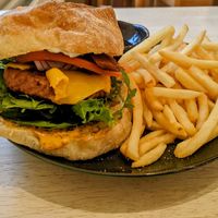 Beyond burger with bacon and fries at The Garden Cafe and Takeaway in Kendal