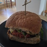 Tastiest smokey vegan black bean & sunflower seed burger to date! at The Garden Cafe and Takeaway in Kendal