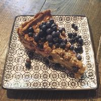 Raw blueberry crumble cake at Nirvana in Riga