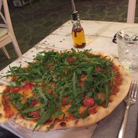 Vegan Pizza with Cherry Tomatos and Rocket Salad at The Seed in Mallorca