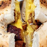Just Egg, Vegan Cheese and Smoked Tempeh Bakon on Everything Bagel at Carmine's Italian Deli in Elmsford