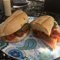Vegan sausage sandwich with a juicy peppers in a marinara sauce.  at Carmine's Italian Deli in Elmsford
