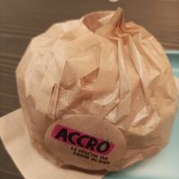 Beautifully wrapped burger at Hank Cuisine Végétale - Rochechouart in Paris