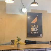 Poster explaining origin of name   at Hank Cuisine Végétale - Rochechouart in Paris