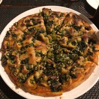 Vegan pizza with cashew cheese at Pumpernickel Bakery and Babylon Cafe in Pokhara