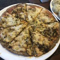 Buckwheat gluten free vegan pizza at Pumpernickel Bakery and Babylon Cafe in Pokhara